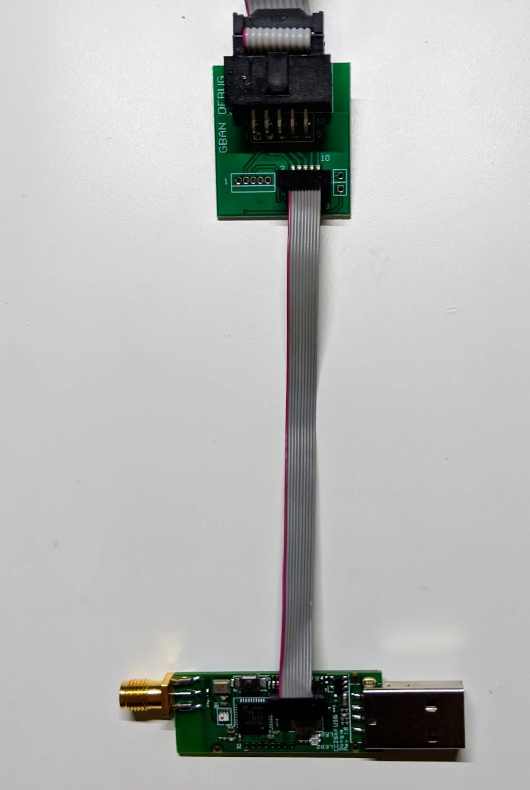 CC Debugger y CC2531 conectados mediante adaptador